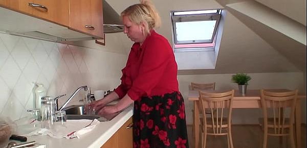  Busty grandmother swallows two cocks at once